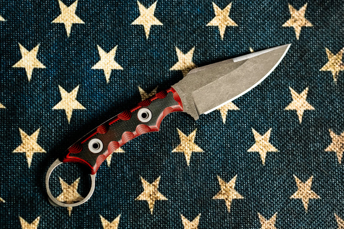 Military knife on american flag