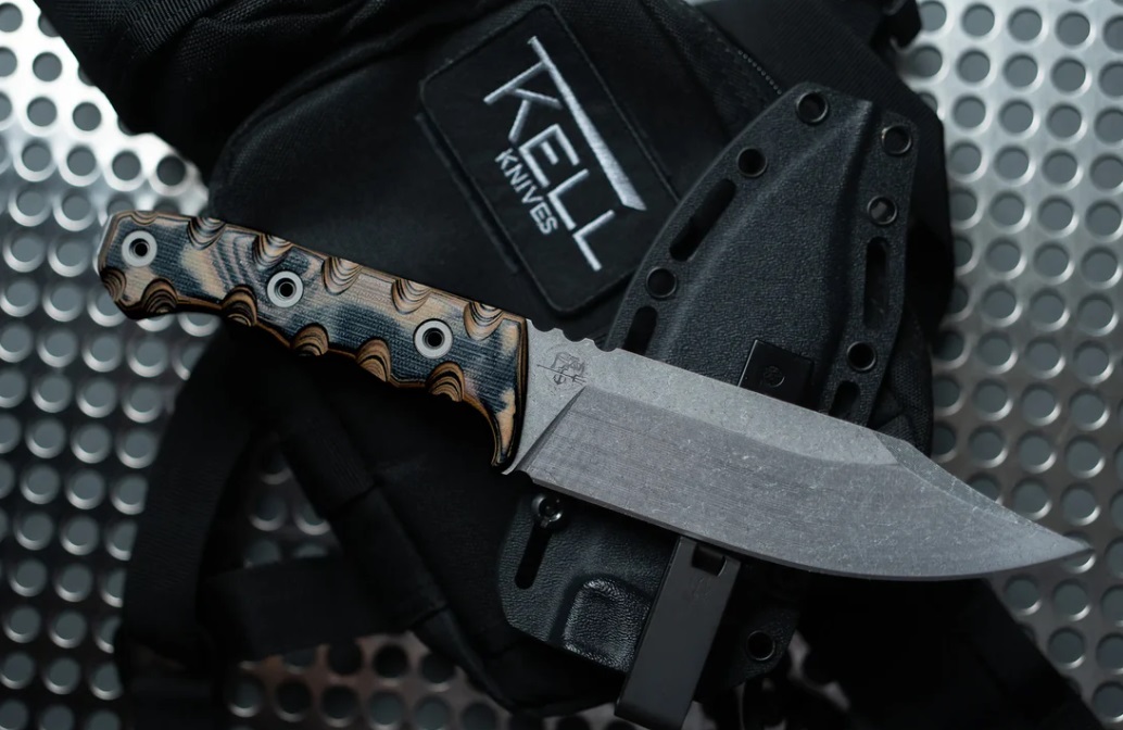 edc knife on tactical background